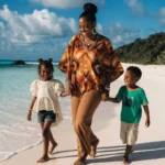 mom and kids enjoying an International destinations for your family vacation on a tropical beach